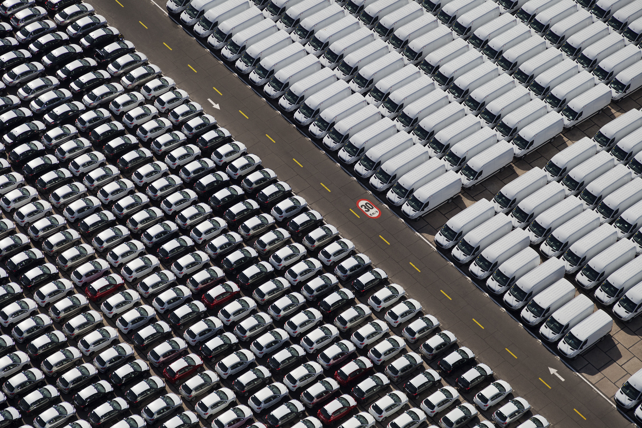 New cars and vans parked